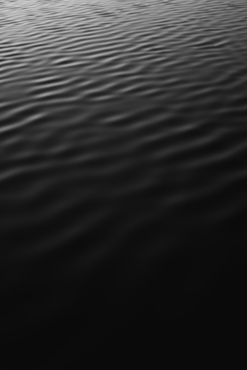 a black and white photo of a body of water