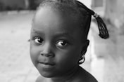 grayscale photography of child