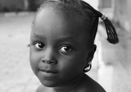 grayscale photography of child