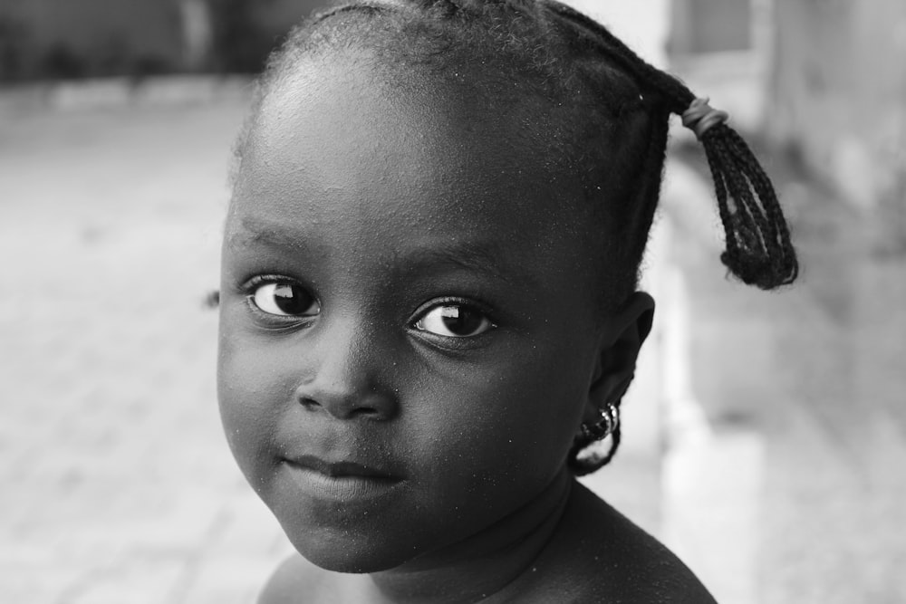 grayscale photography of child