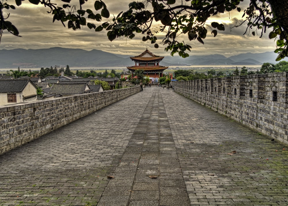 gray concrete pathway during daytime