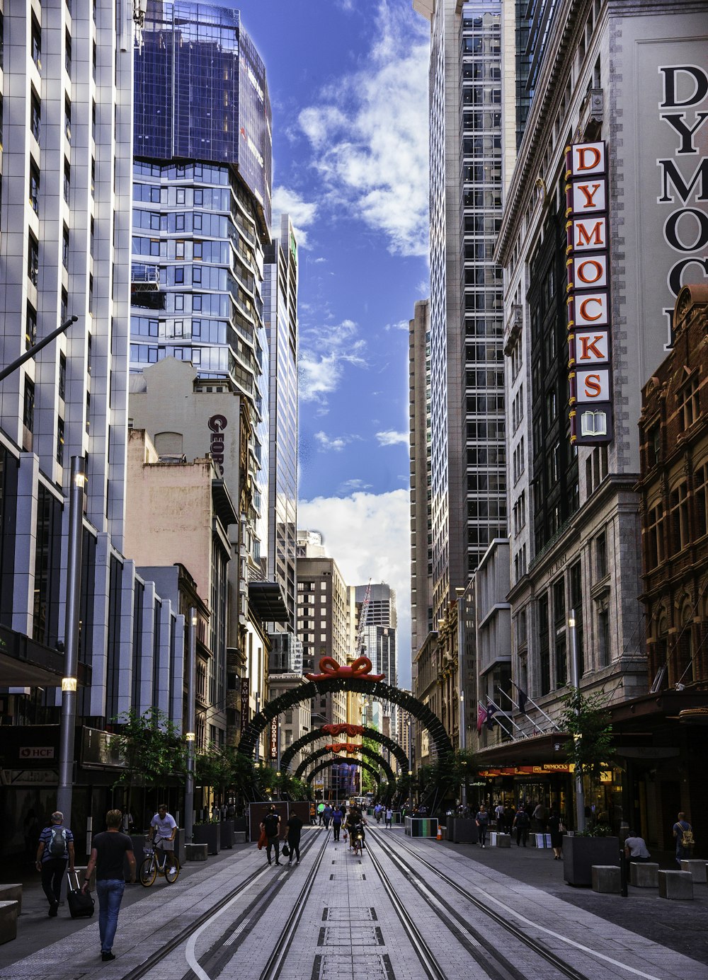 people walking on road during daytime