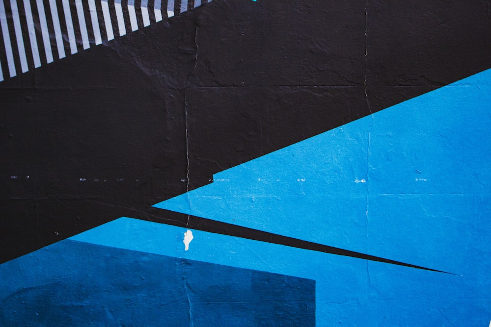 a skateboarder is doing a trick on a wall