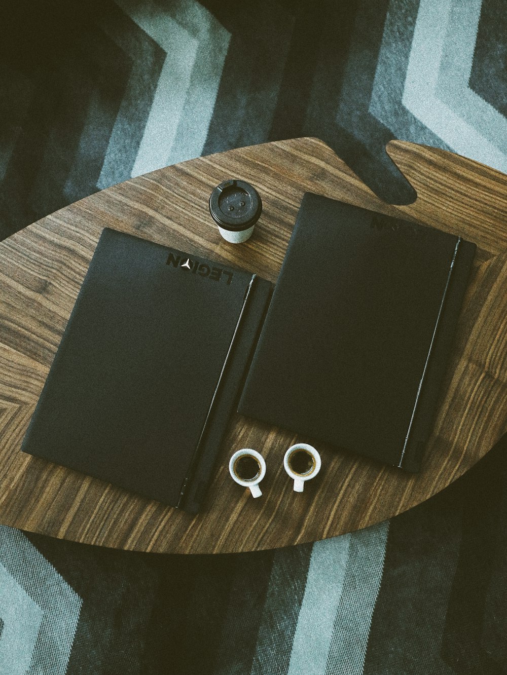 two black books on table