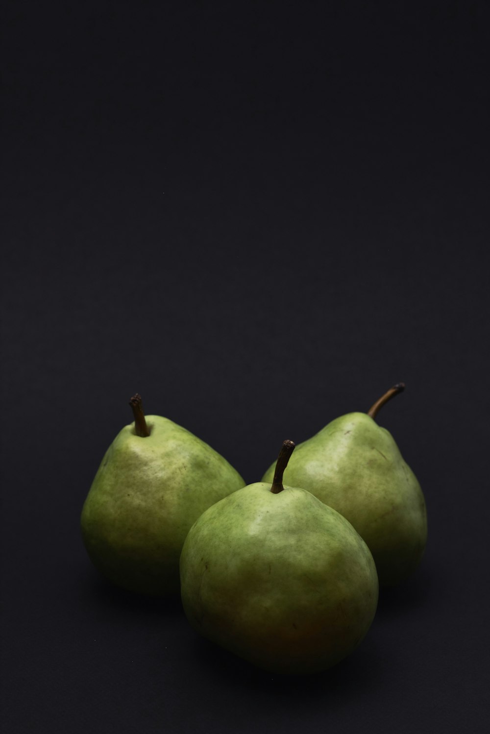 three green fruits