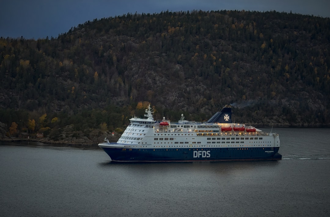 white and blue DFDS cruise ship