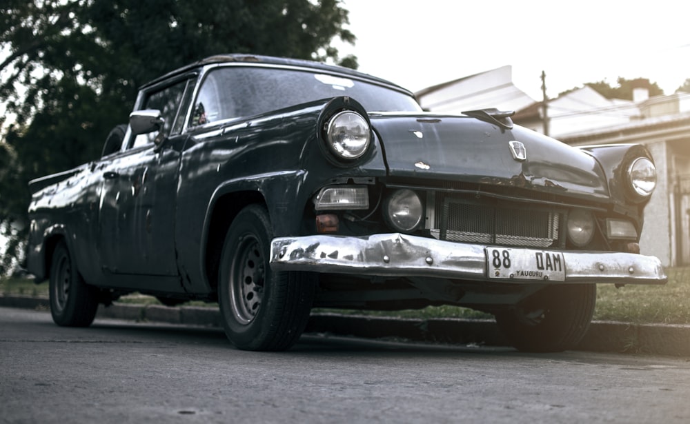 selective focus photography of black convertible coupe