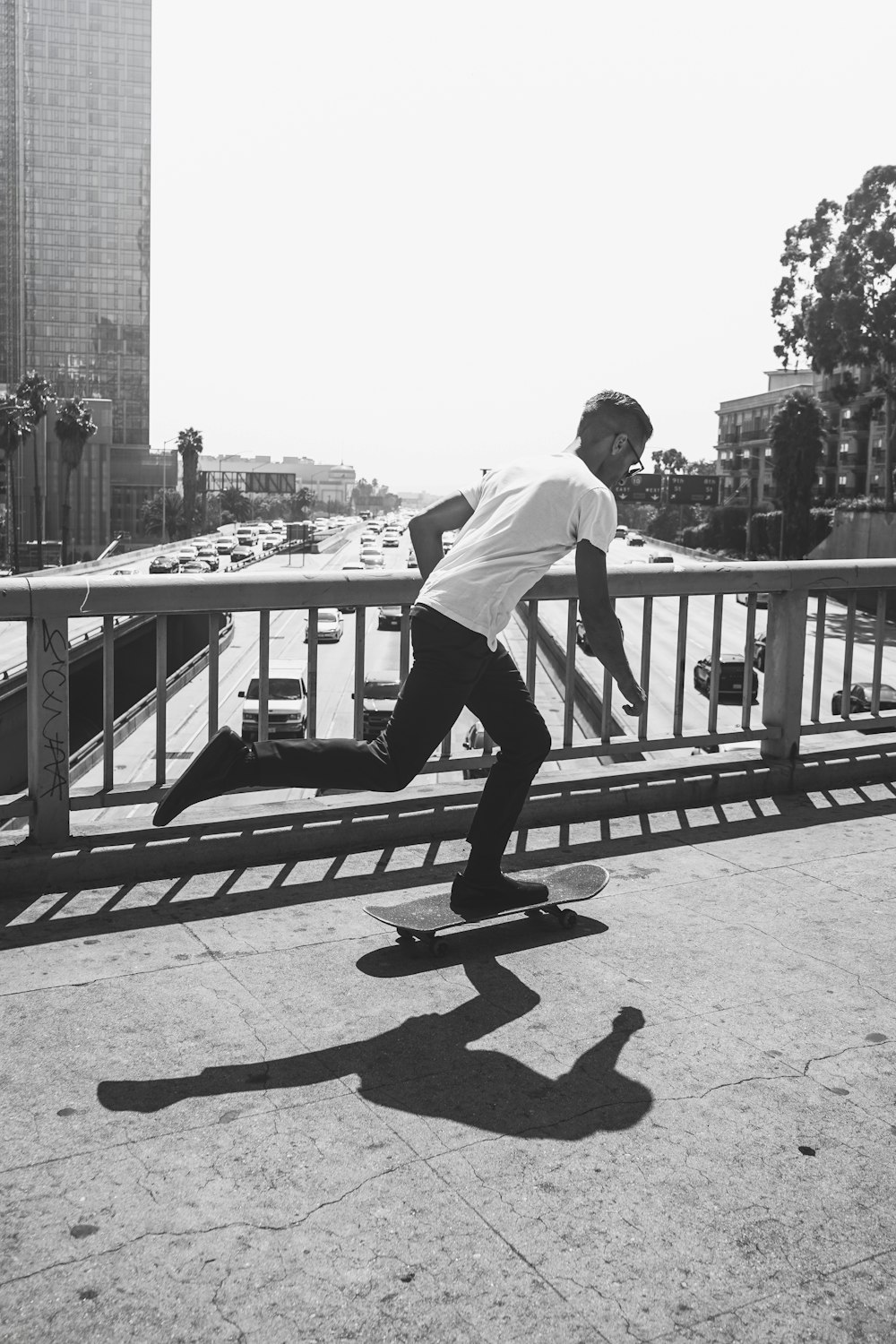 grayscale photograph of man running