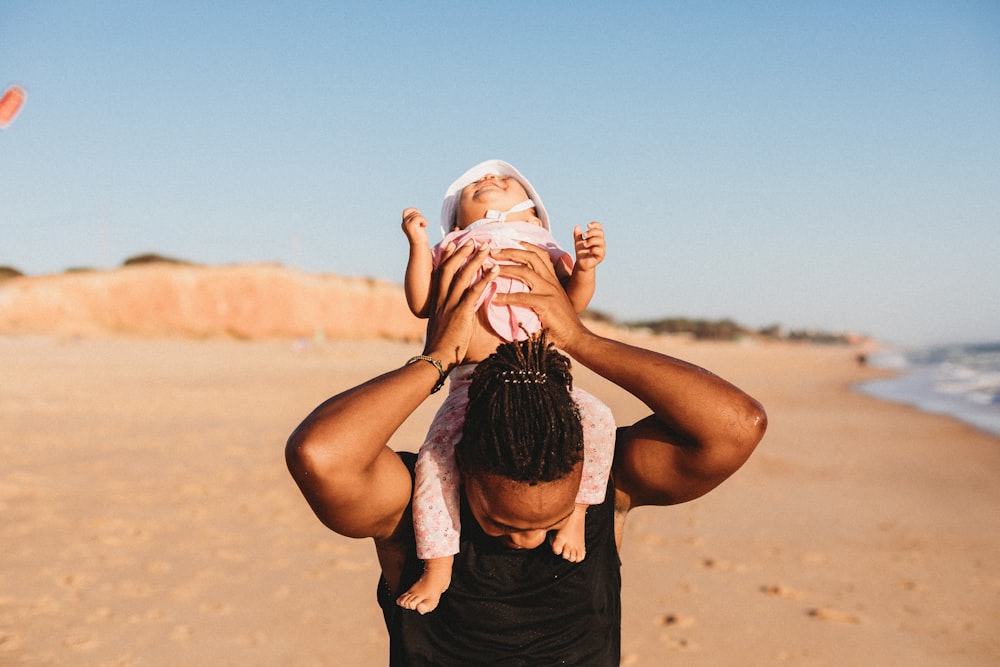 person holding baby