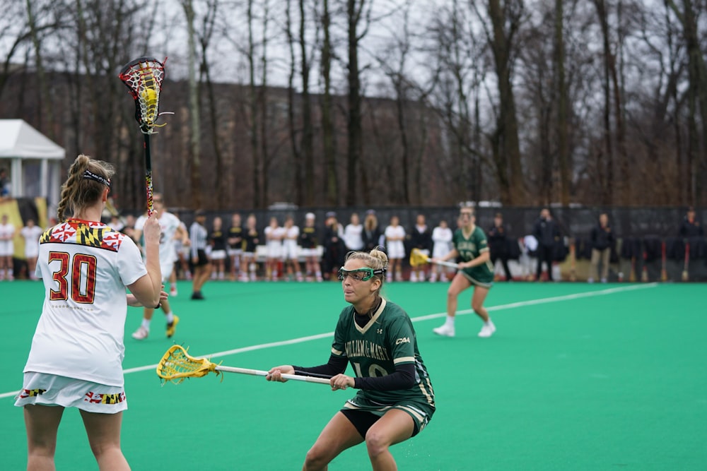 women playing lacrosse