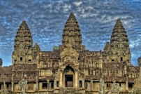 Angkor Wat: Largest religious monument in the world, built by the Khmer Empire in Angkor, Cambodia.