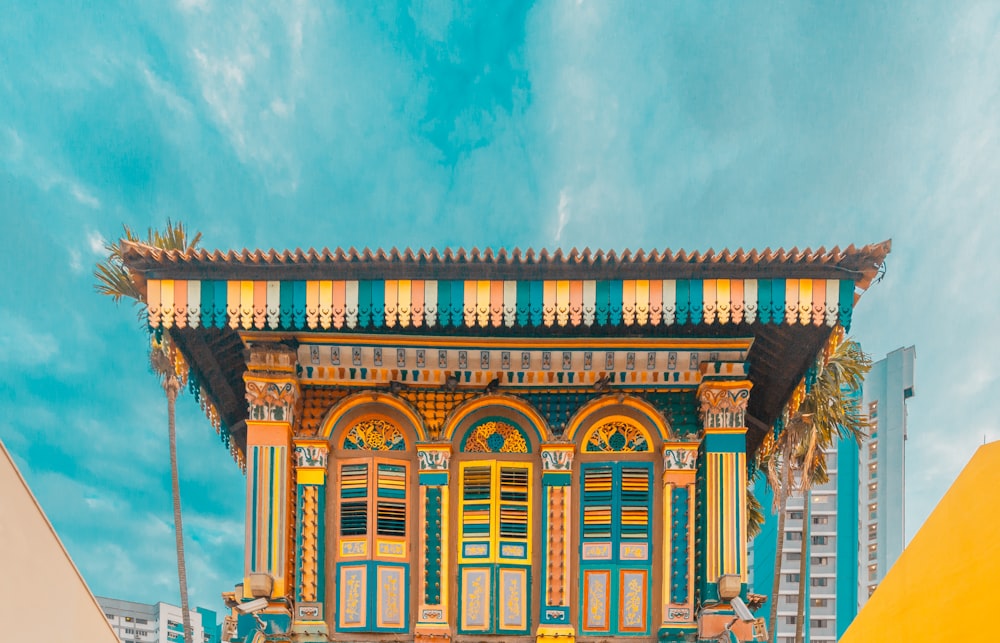 multicolored concrete building under blue sky