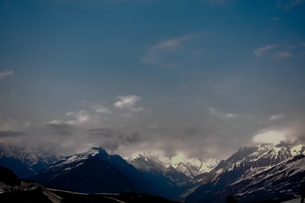 mountain under cloudy sky