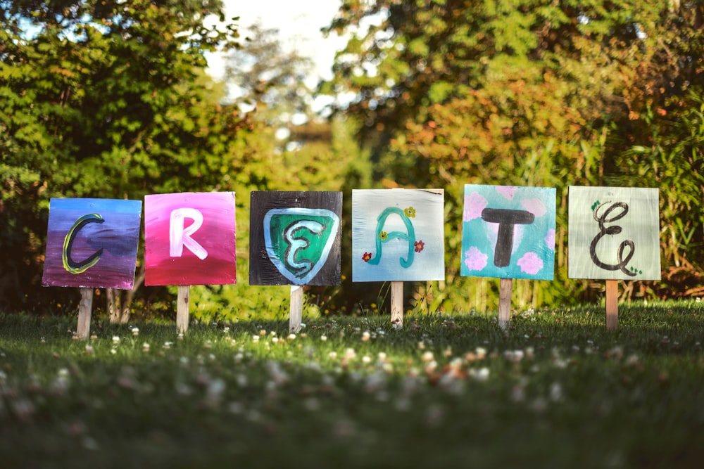 selective focus photo of create signage