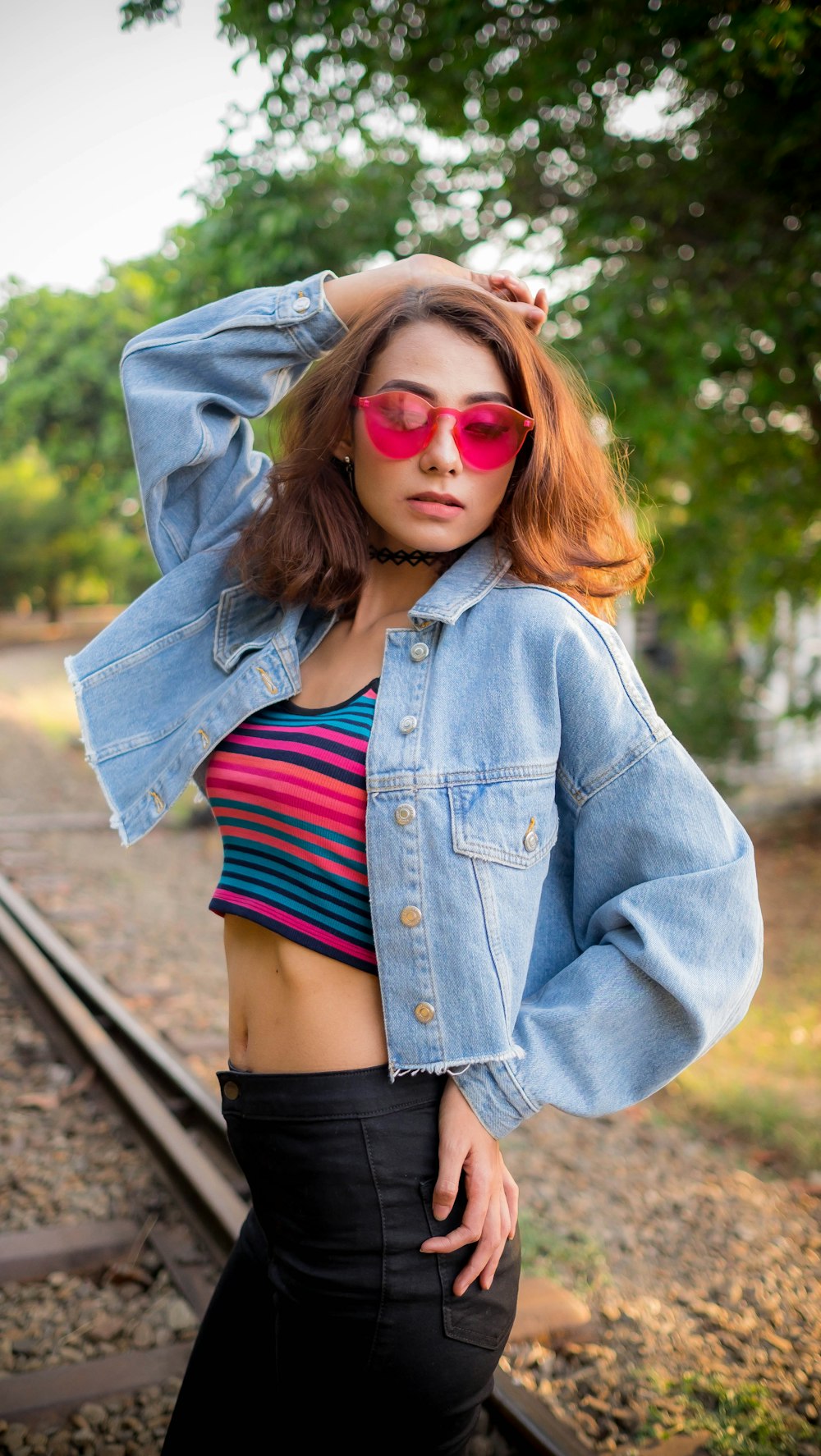 woman standing on railway