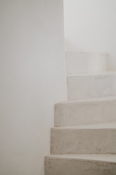 a close up of a set of white stairs