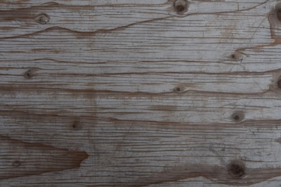 Close-up of the natural texture and finish of recycled pine wood furniture