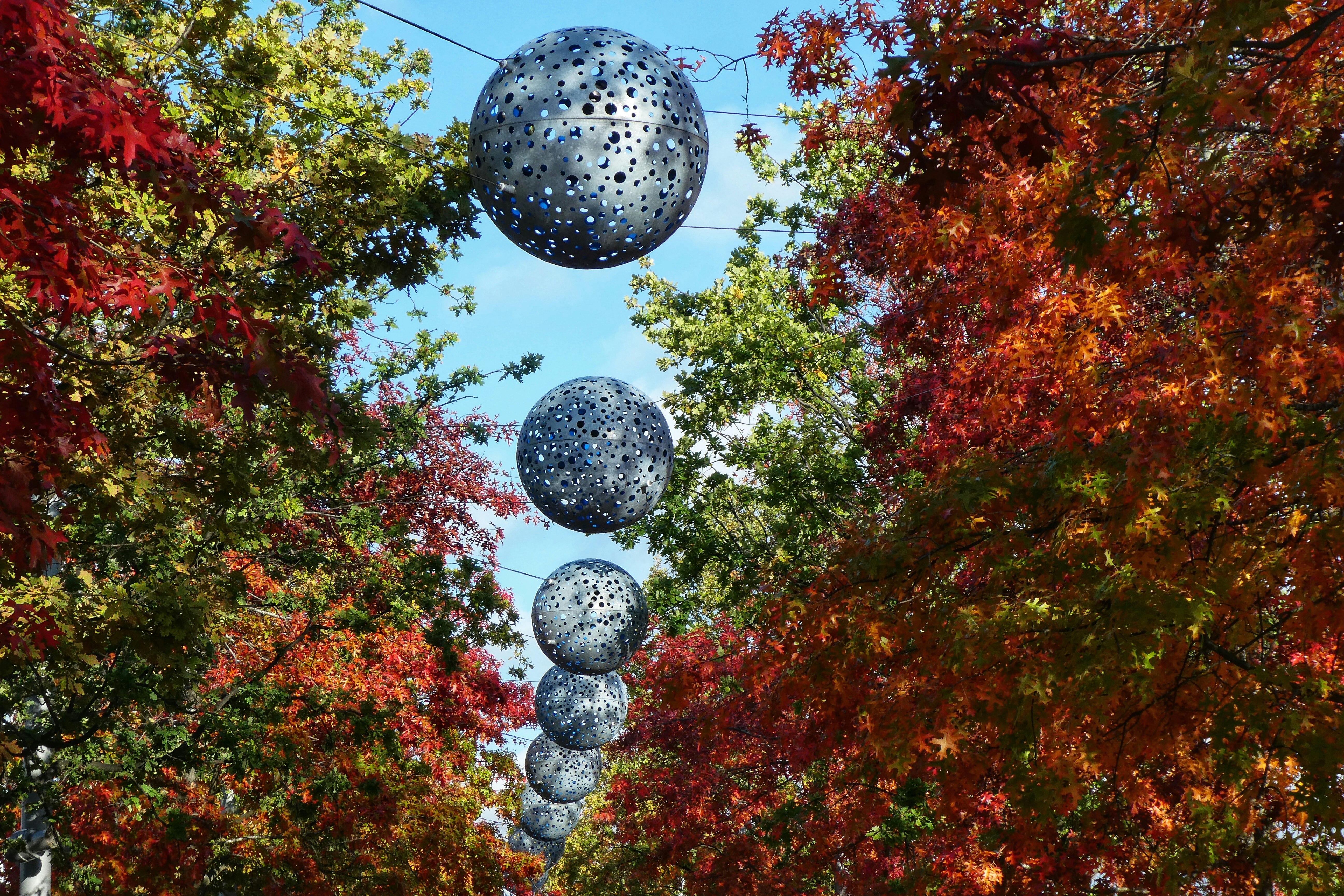 low angle photography of decorative balls hanging