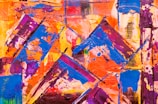 Vibrant abstract painting bursting with bold colors and dynamic shapes.