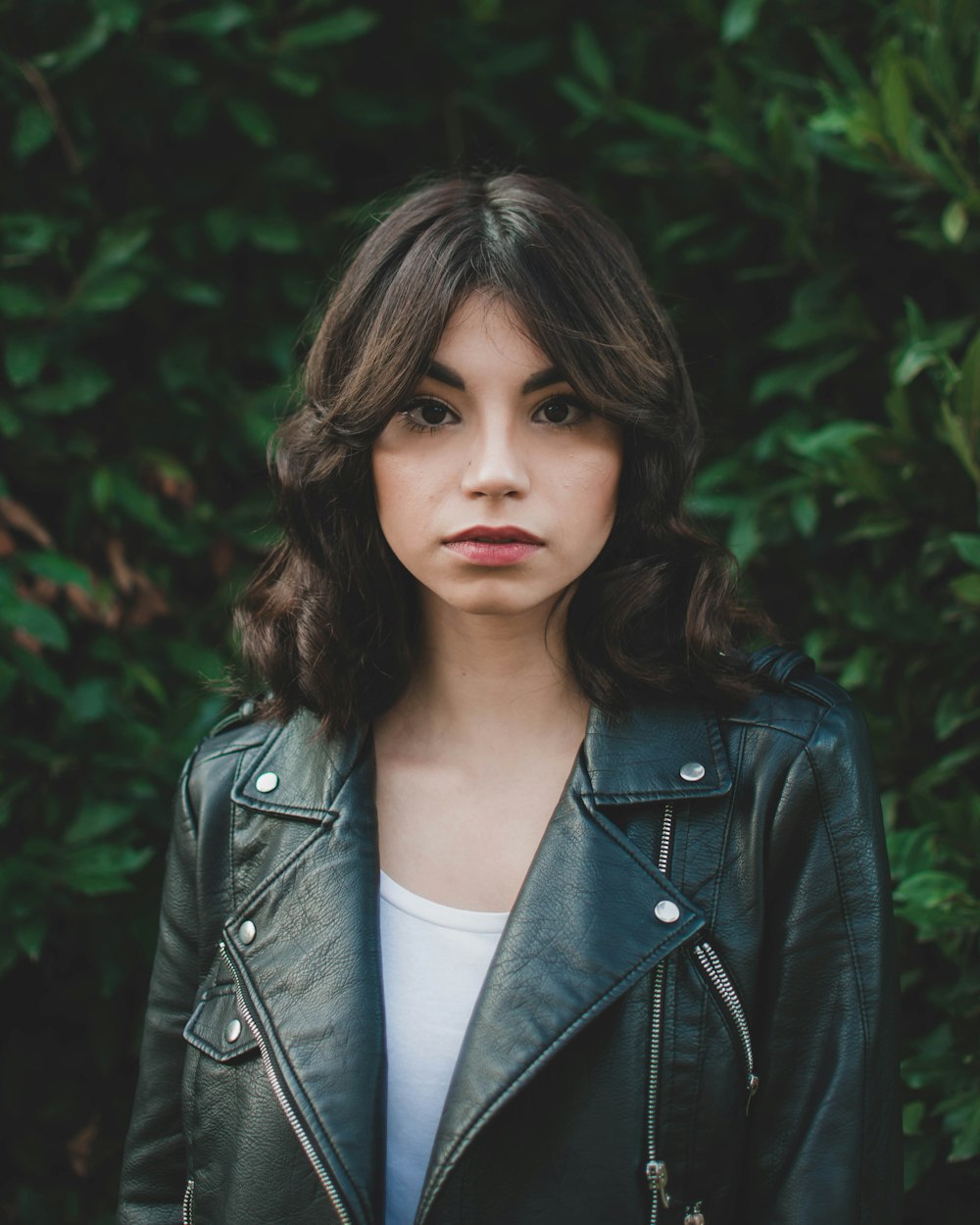 woman wearing black leather jacket