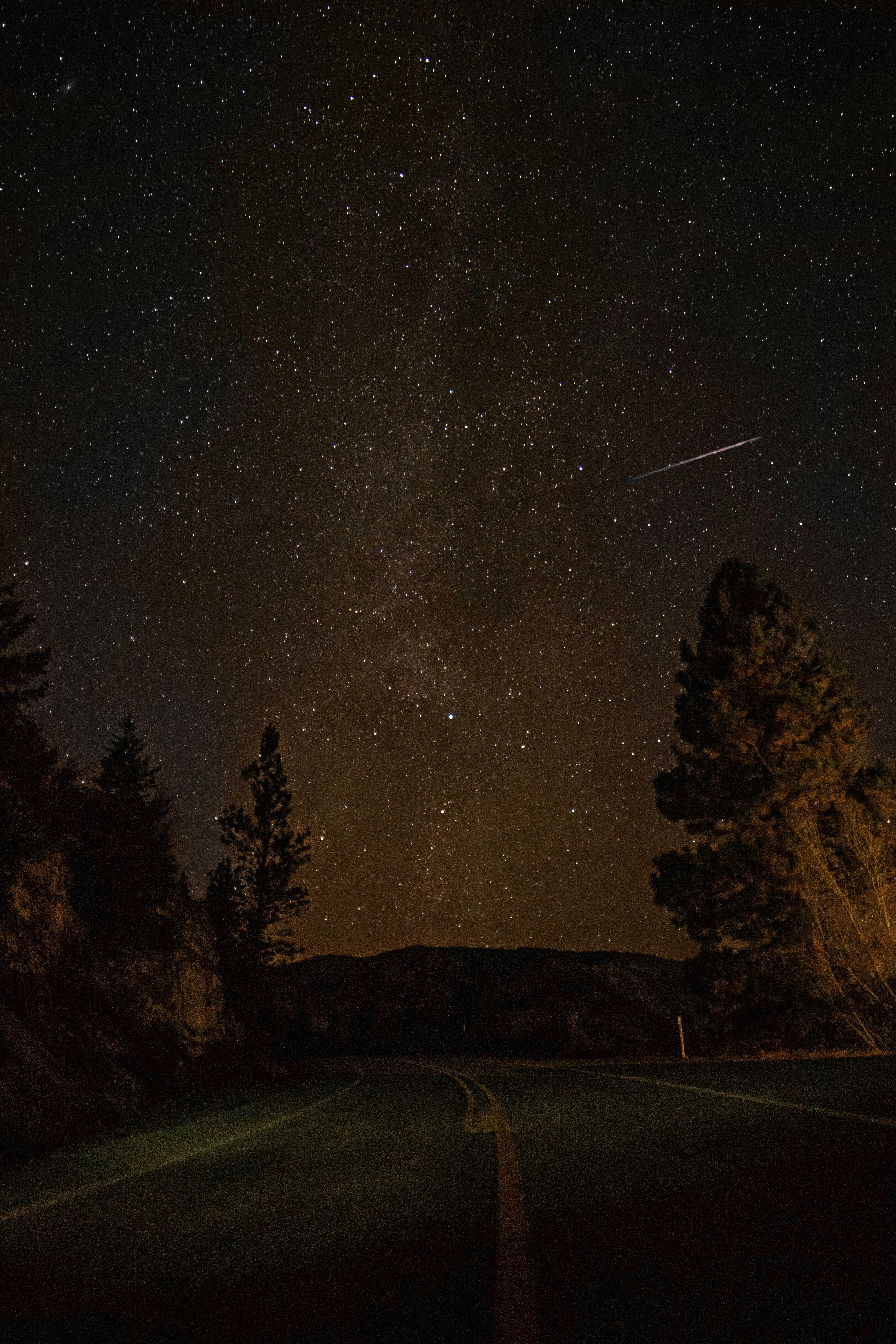 gray concrete road during nighttime
