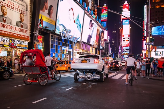 vehicle on road at night-time in Times Square United States
