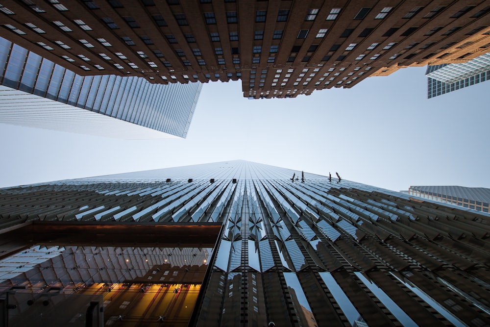 low-angle photography of high-rise buildings