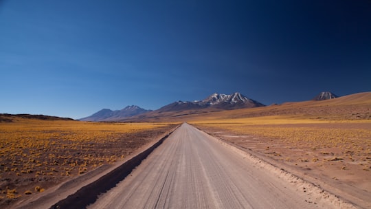 brown road during day time in San Pedro de Atacama Chile