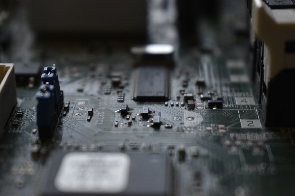 brown circuit board in close-up photography