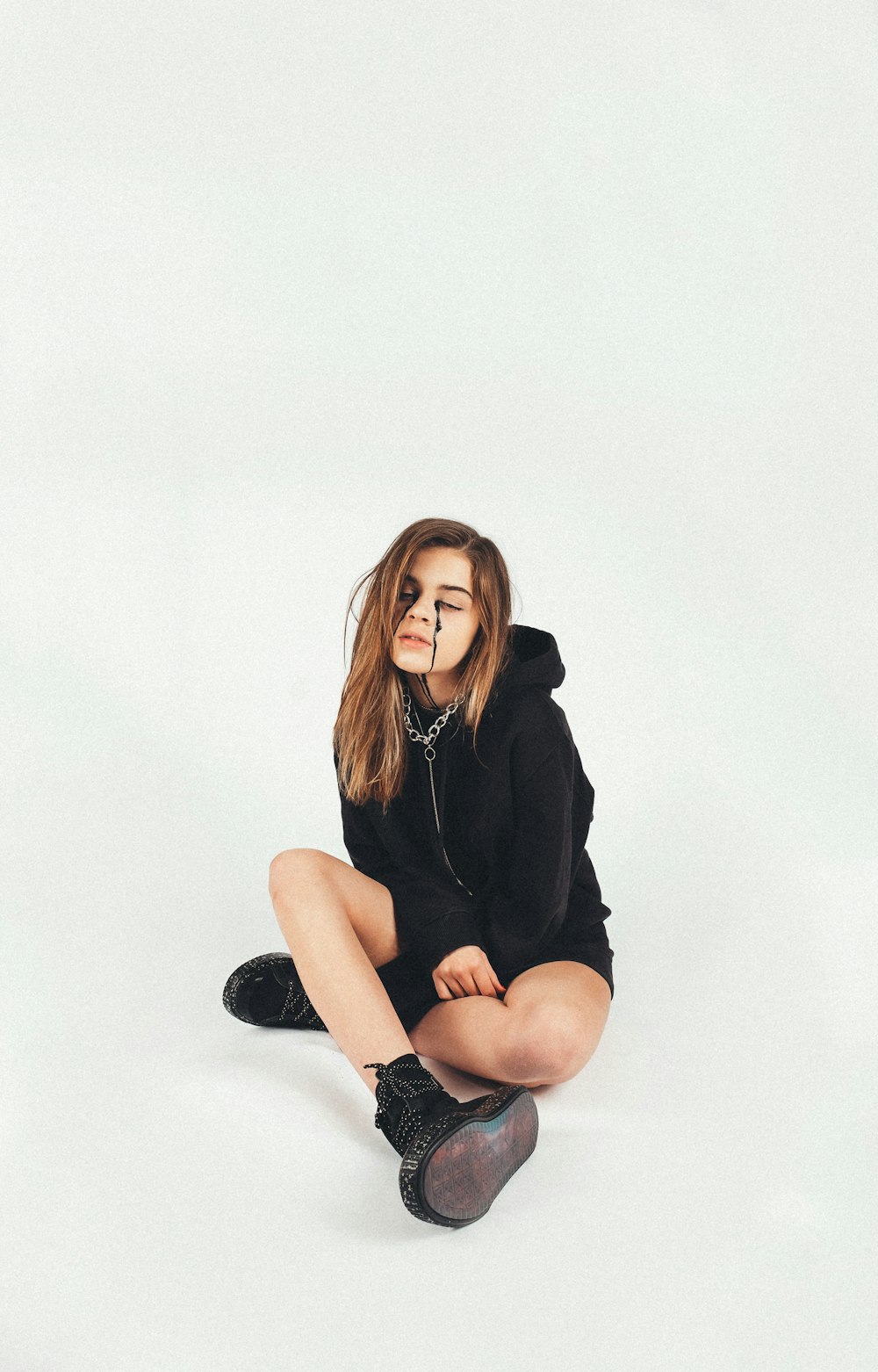 woman wearing black pullover hoodie