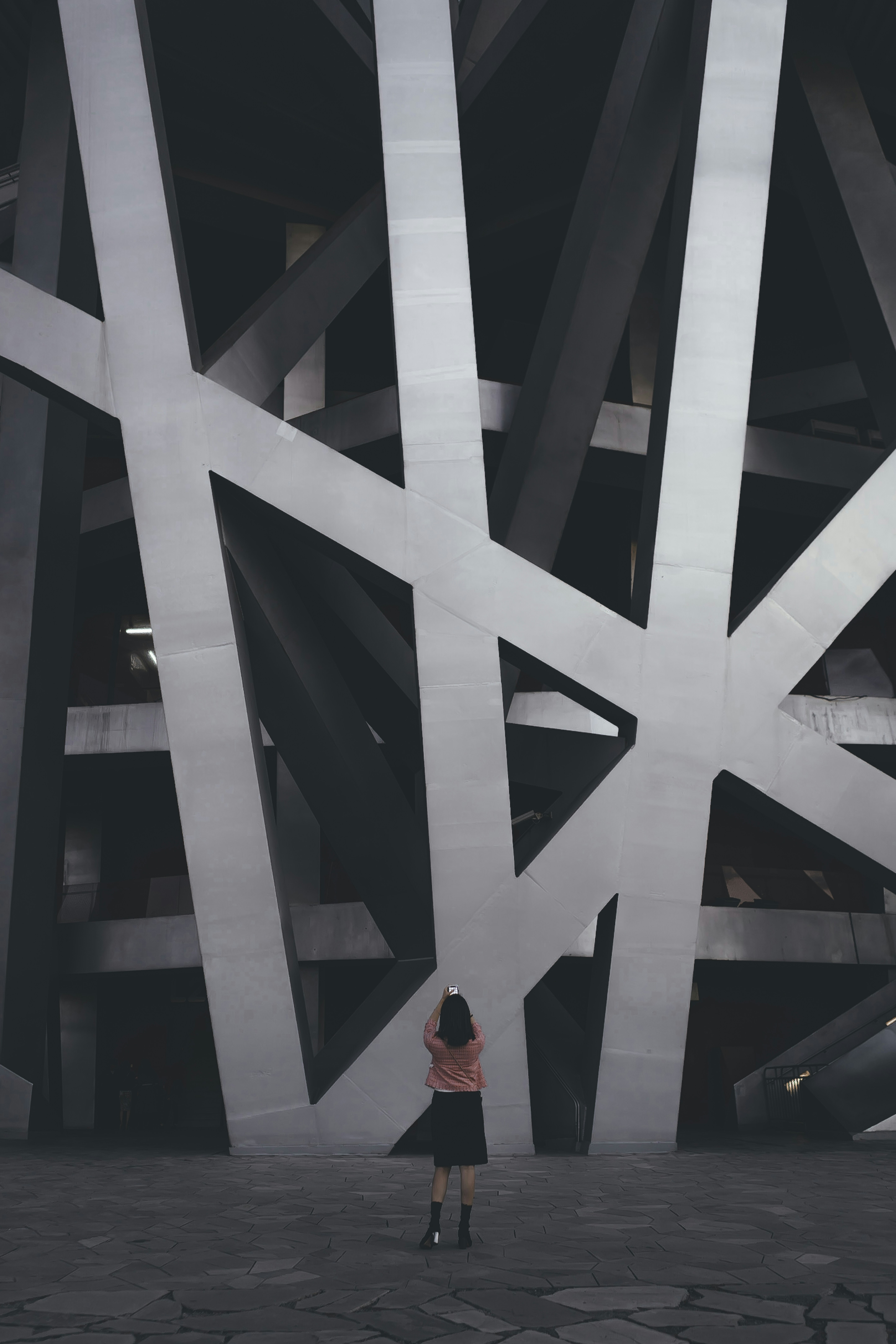 woman standing near building