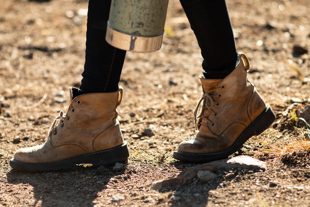 person wearing beige booties