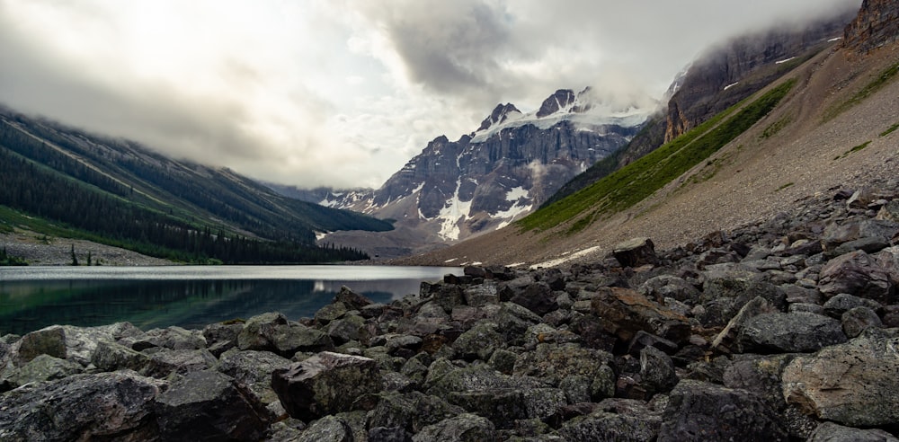 rocky shore with mountain background