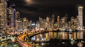 city lights and buildings during nighttime