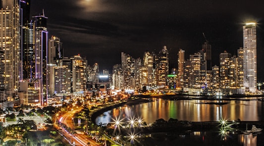 city lights and buildings during nighttime