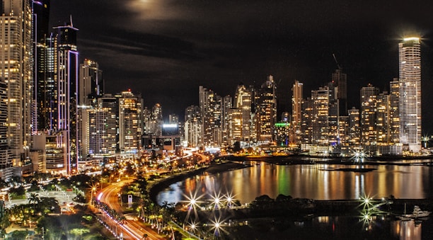 city lights and buildings during nighttime