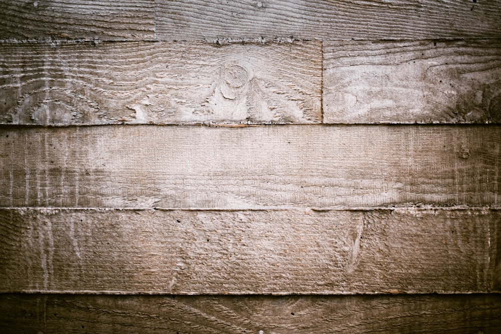 close-up photography of brown wooden board