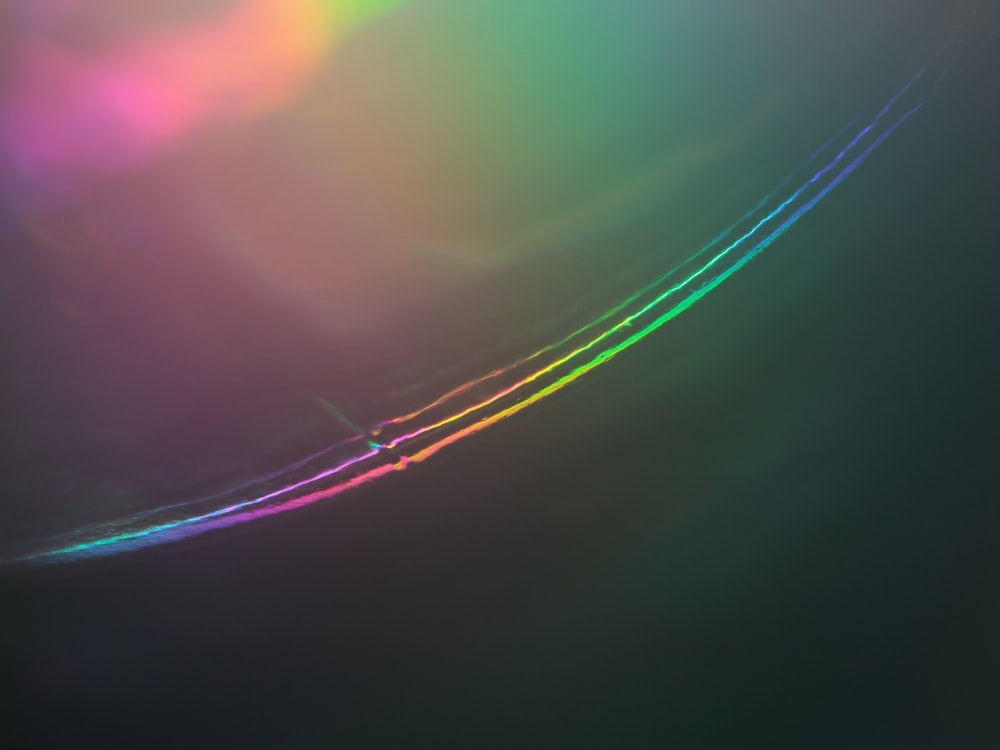 a close up of a rainbow colored object