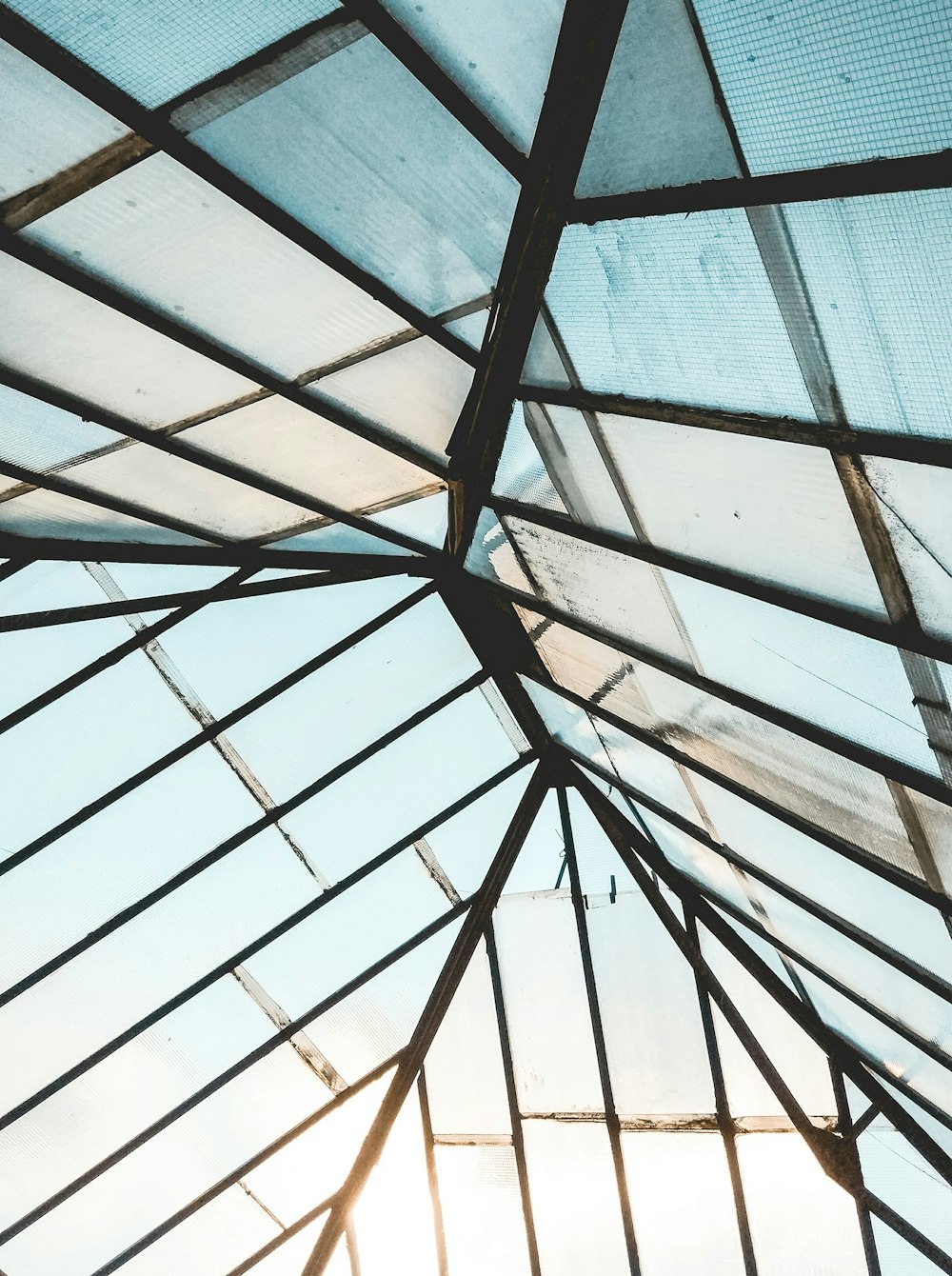 the inside of a building with a glass roof