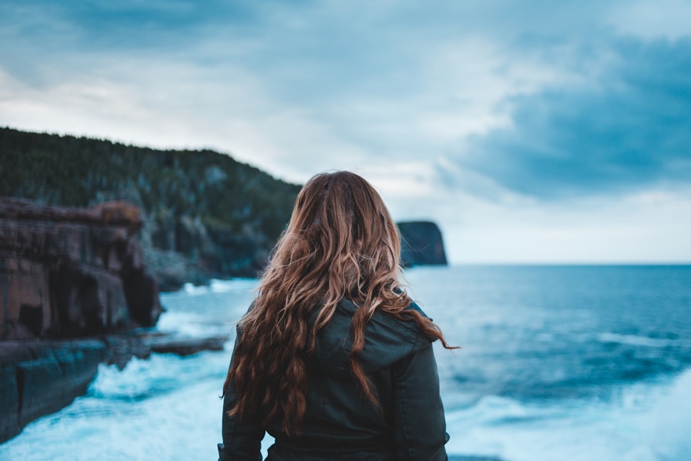 woman standing near sea