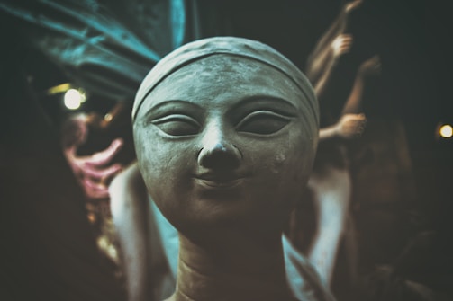 Close-up of a delicate clay relief sculpture before casting.