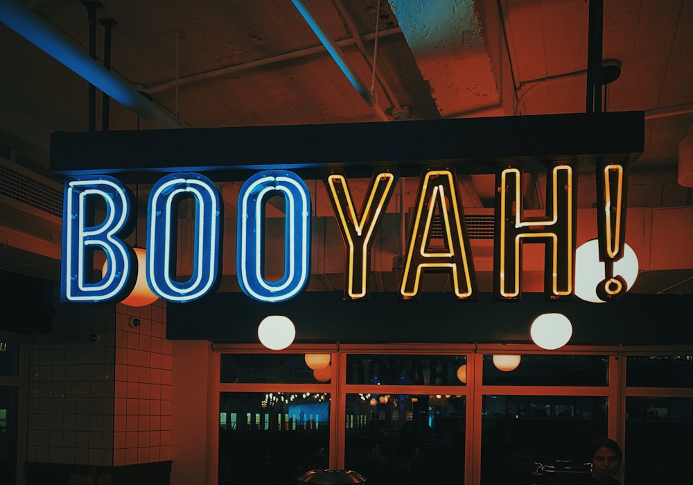 turned-on booyah! neon signage