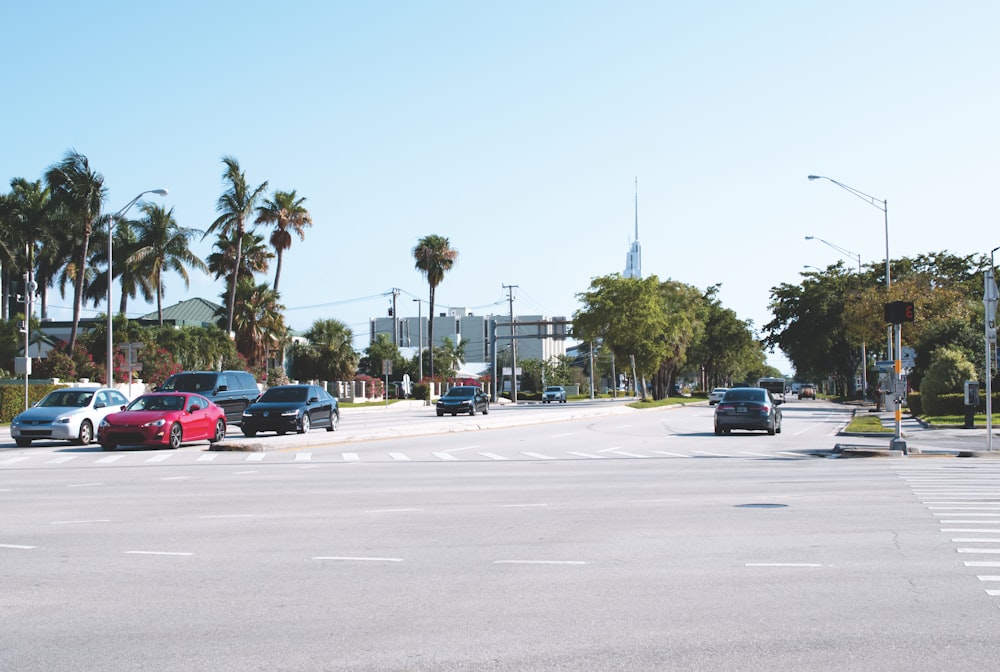 assorted-brand vehicles on the road during daytime