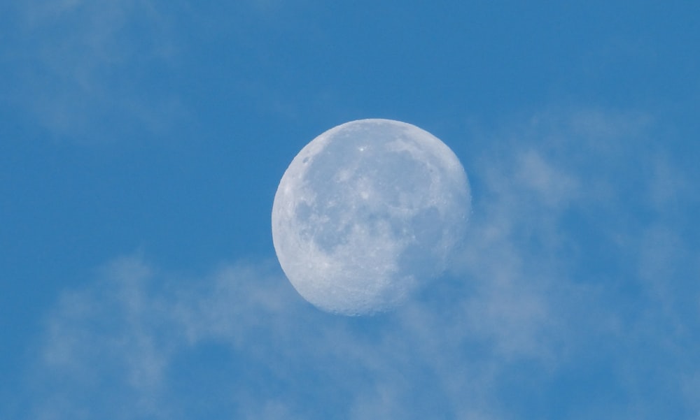 moon surrounded with cirrus clouds