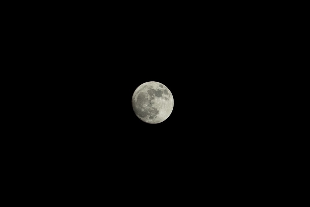 grayscale photography of full moon