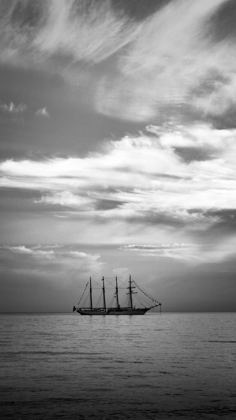 greyscale photo of boat