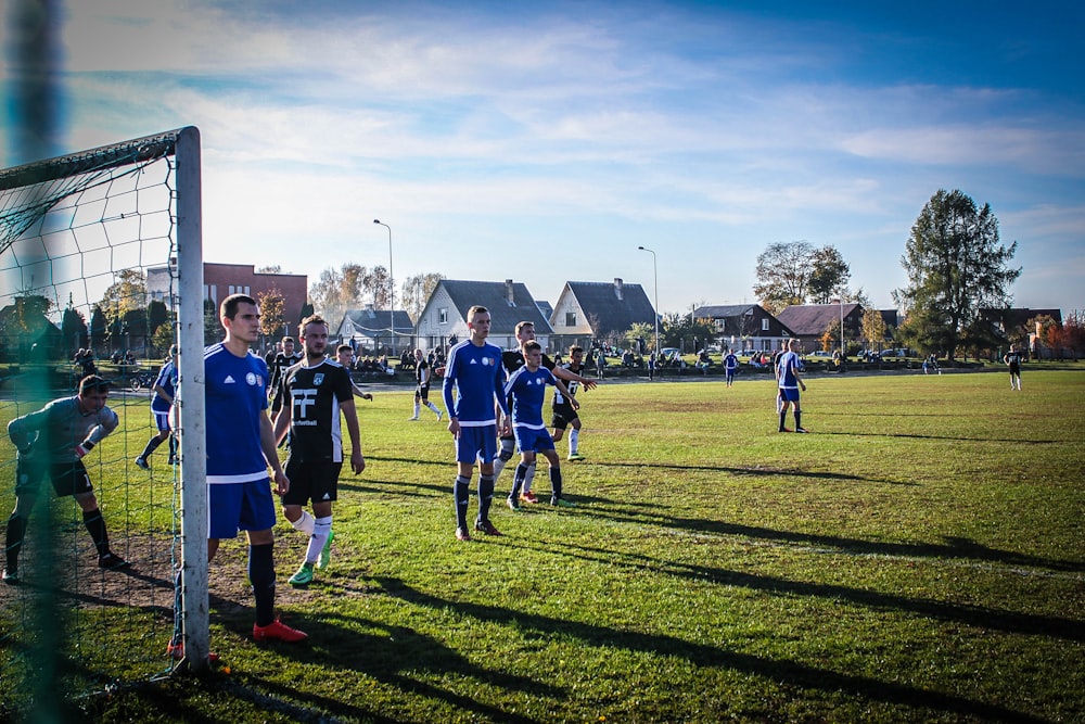 group of football player under blue sky