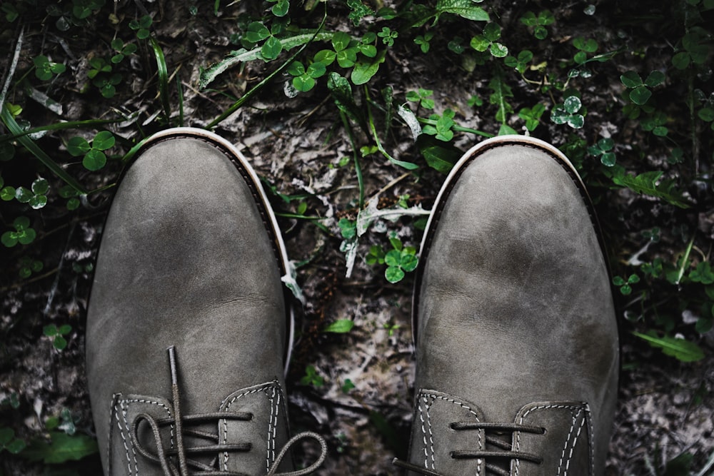 flat lay photography of black shoes