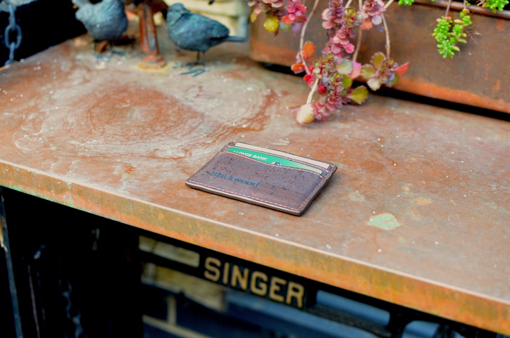 brown Singer sewing table