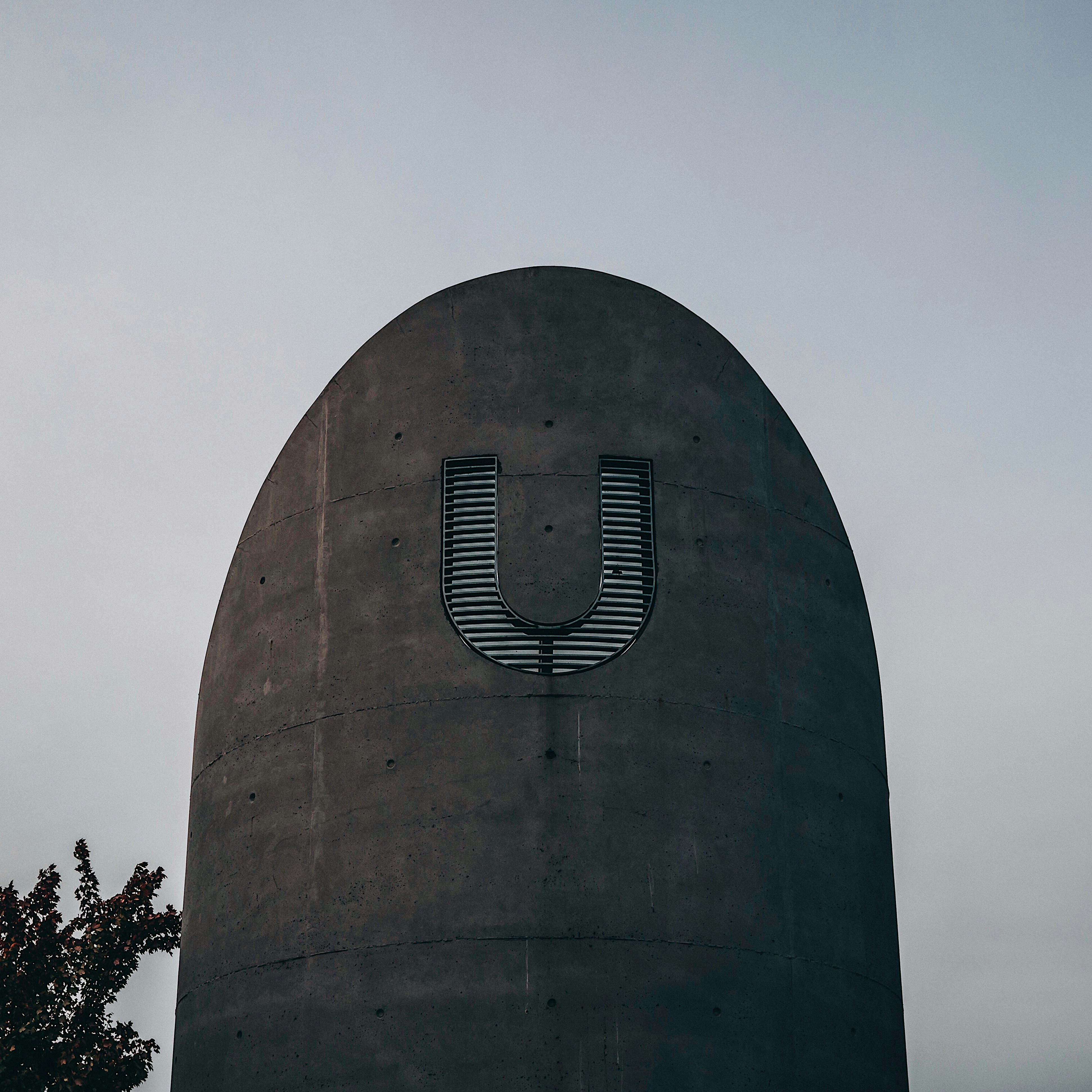 low-angle photography of black building